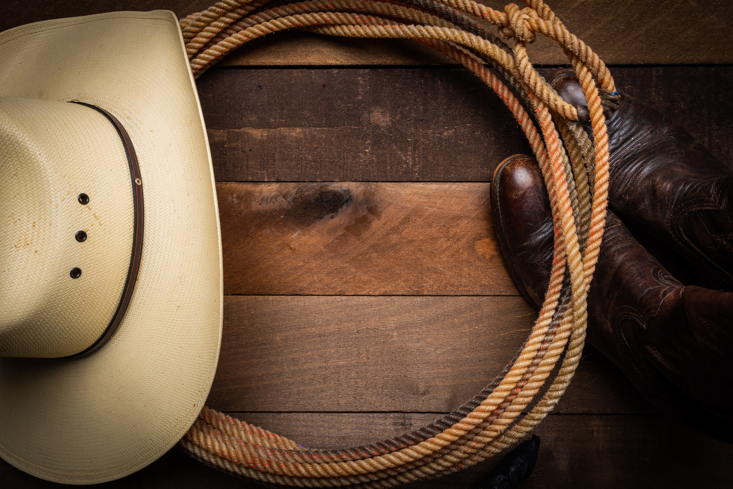 Cowboy Supplies on wood background